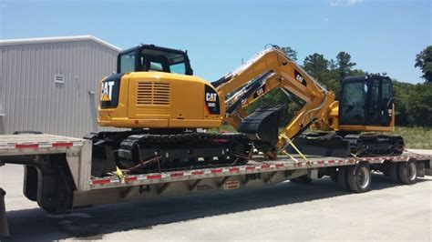 mini excavator on flatbed truck|mini on flatbed truck.